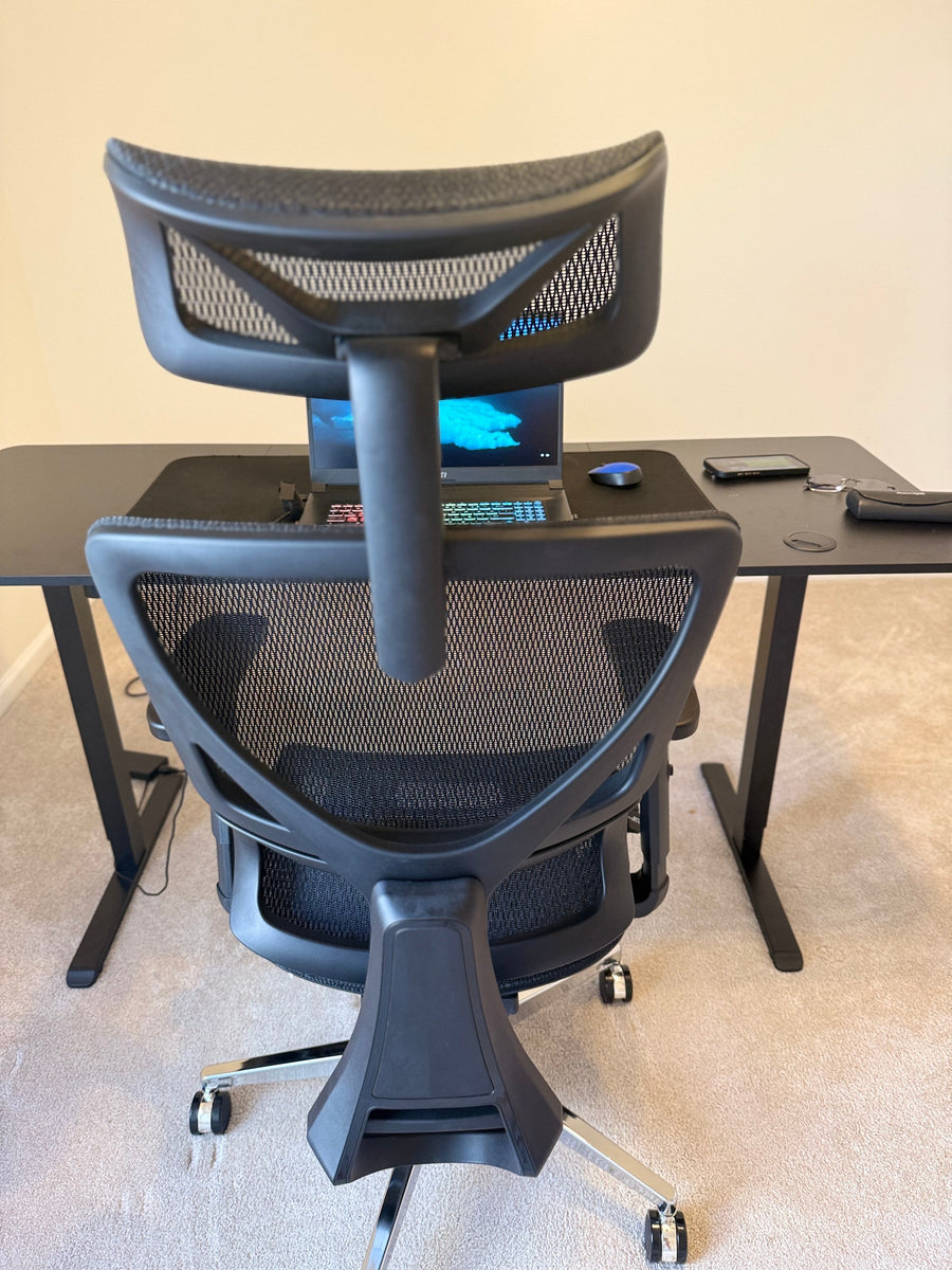 Rear view of an OdinLake L1 chair showing the headrest stem and complete backrest