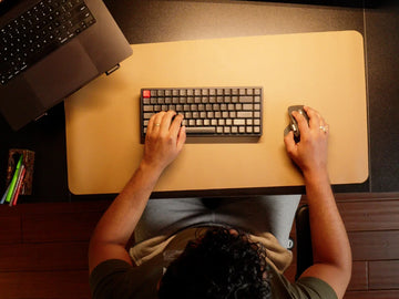 Overhead view of a person working at an OdinLake adjustable desk