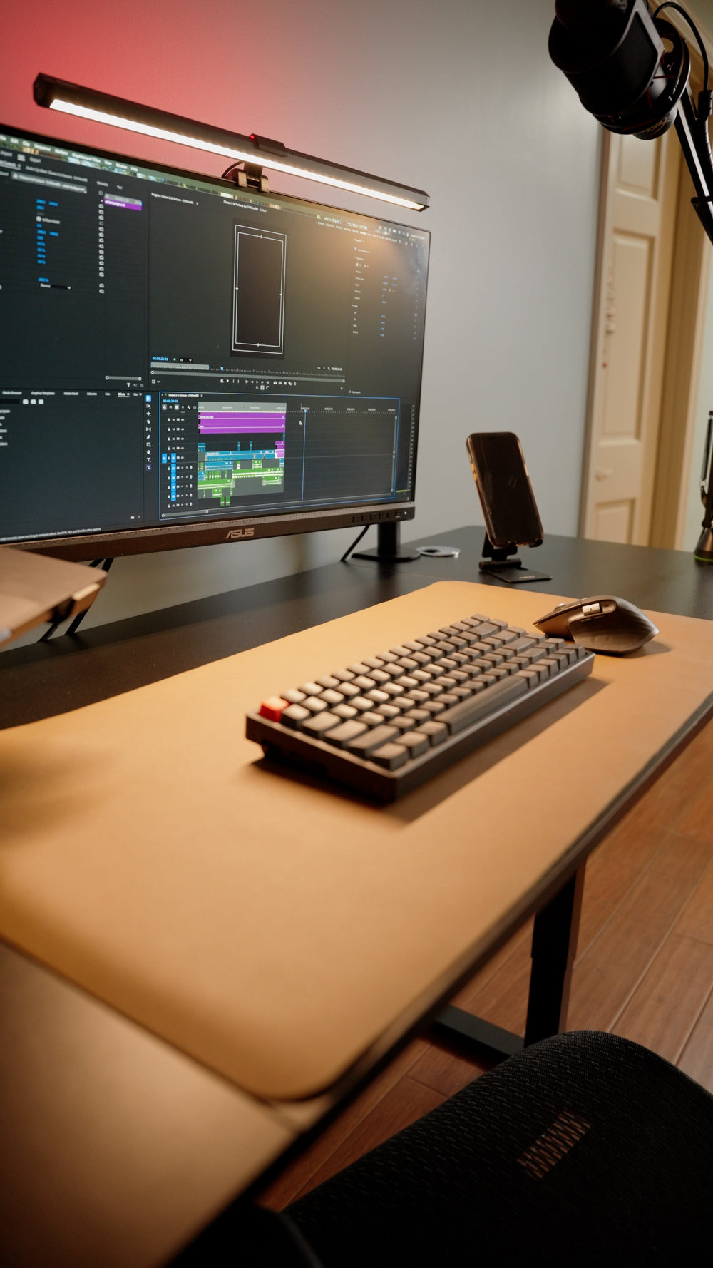 OdinLake computer desk with a monitor, keyboard, and mouse arranged across the desktop depth